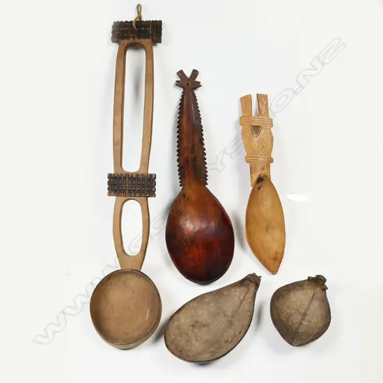 Five tribal carved wooden and coconut shell spoons,